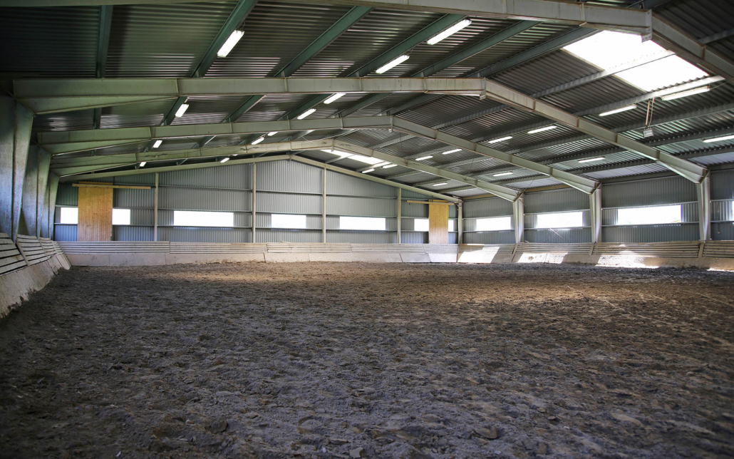 Crew aiming stadium light fixtures
