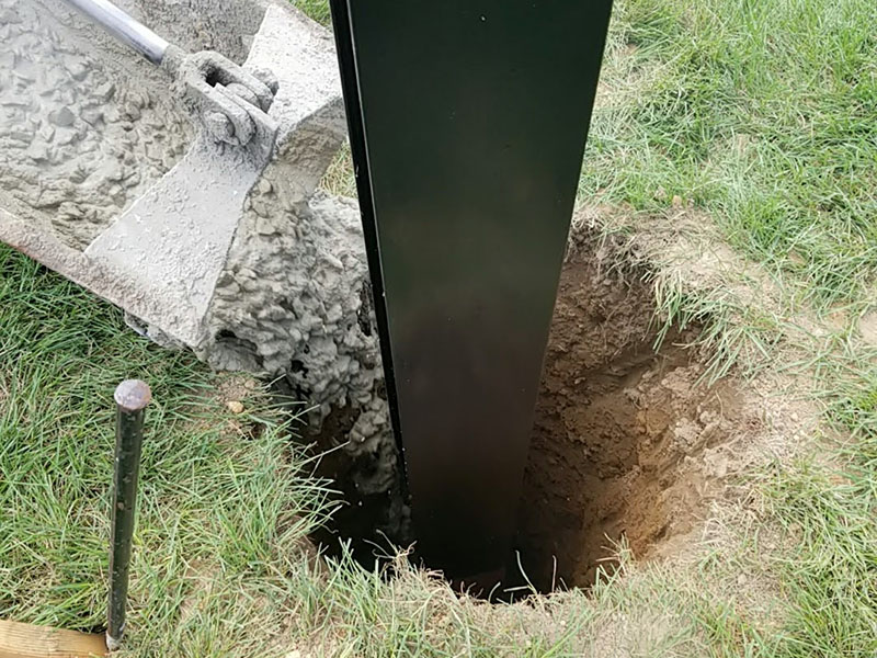 Crew preparing foundation for new scoreboard structure