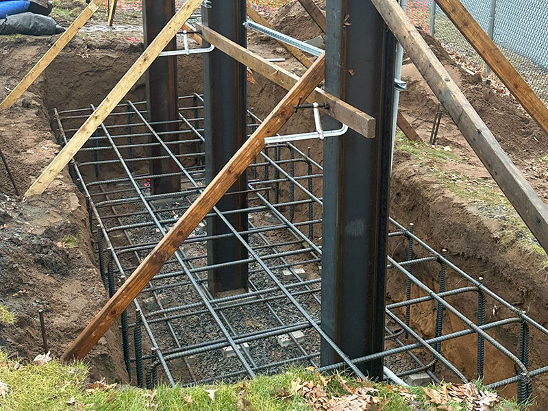 Erected steel framework for signage