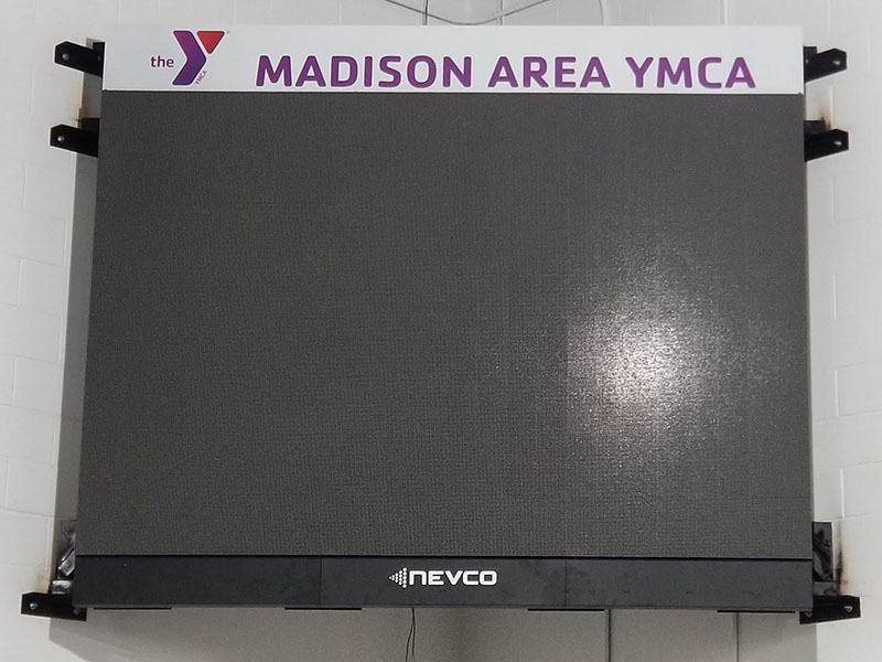 Crew installing videoboard panels